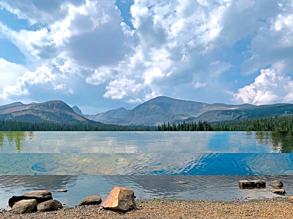 clouds above idyllic mountain lake